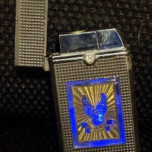 Vintage Silver & Gold Metal Lighter with Blue Eagle Design